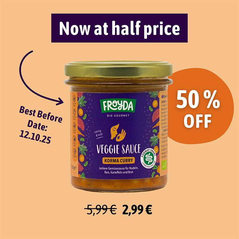 Jar of Froyda Veggie Sauce Korma Curry with promotional text on a beige background